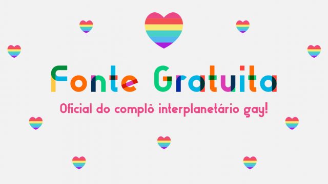 Texto colorido como o arco-íris diz "Fonte Gratuita", seguido de "Oficial do complô interplanetário gay"". Ao background, vários corações em arco-íris se espalham pelo quadro.